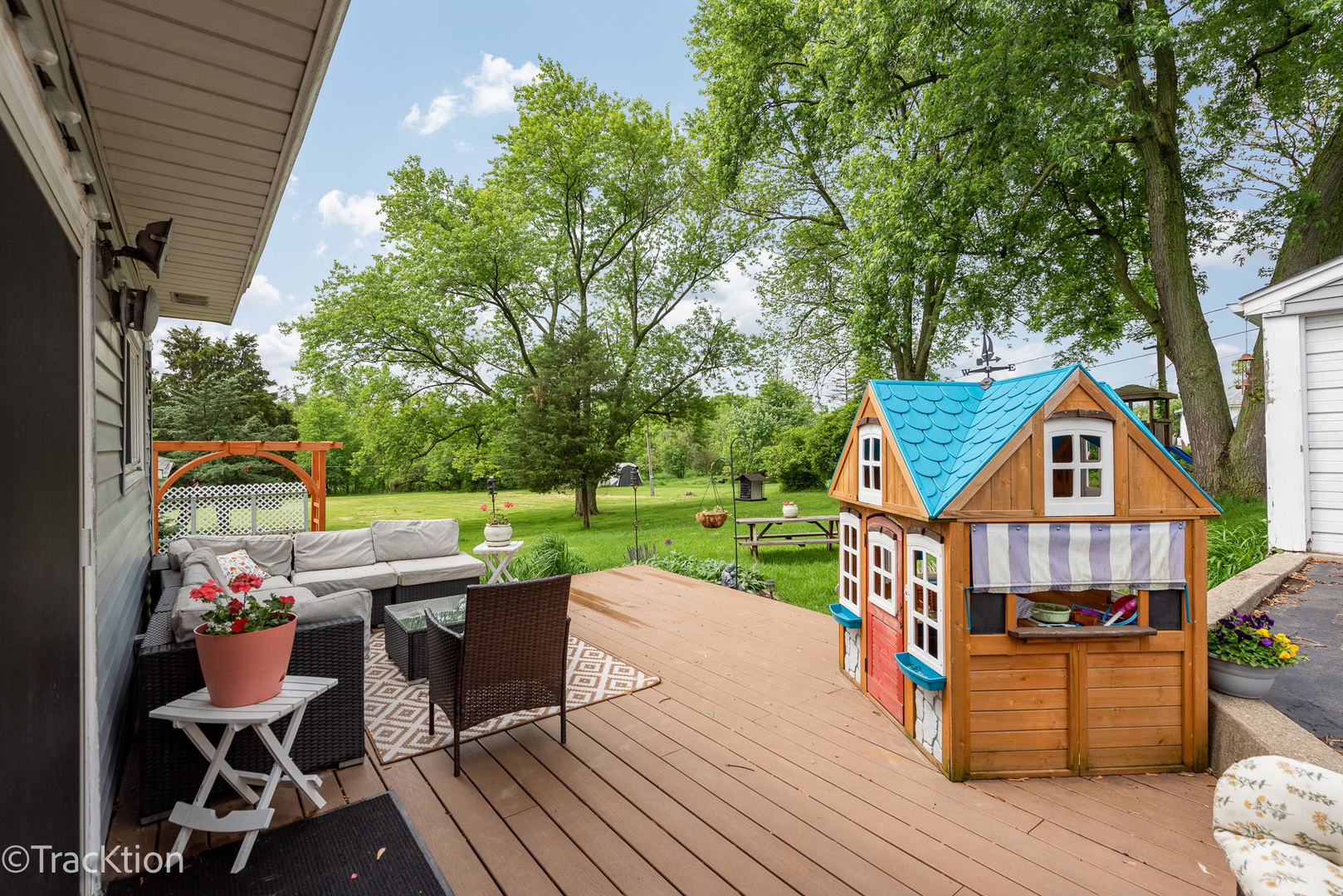 10S450 Ruth Drive Lemont, IL 60439 - Photo 19 of 22 a view of a chairs and table on the wooden deck