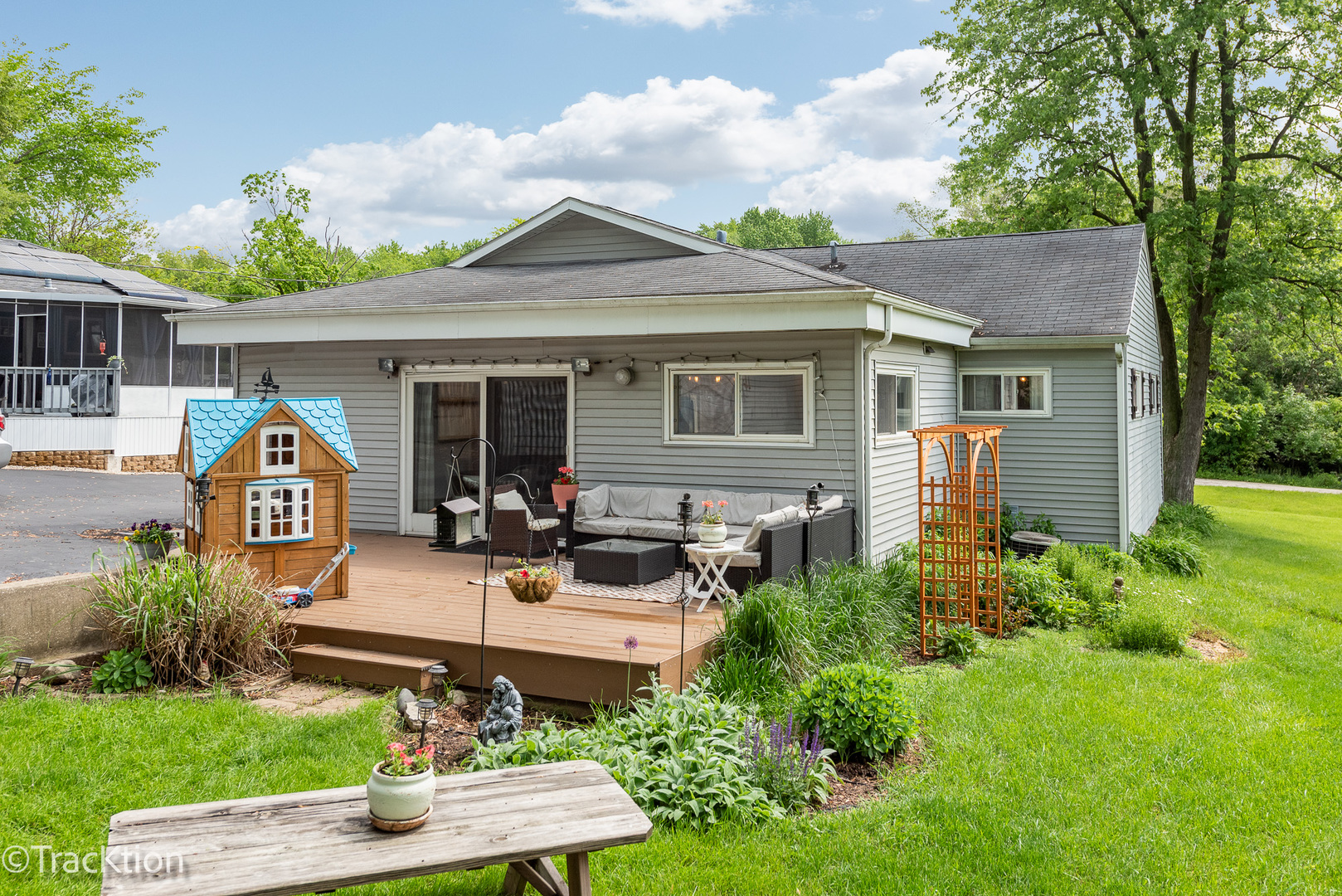 10S450 Ruth Drive Lemont, IL 60439 - Photo 20 of 22 a view of a house with backyard sitting area and garden
