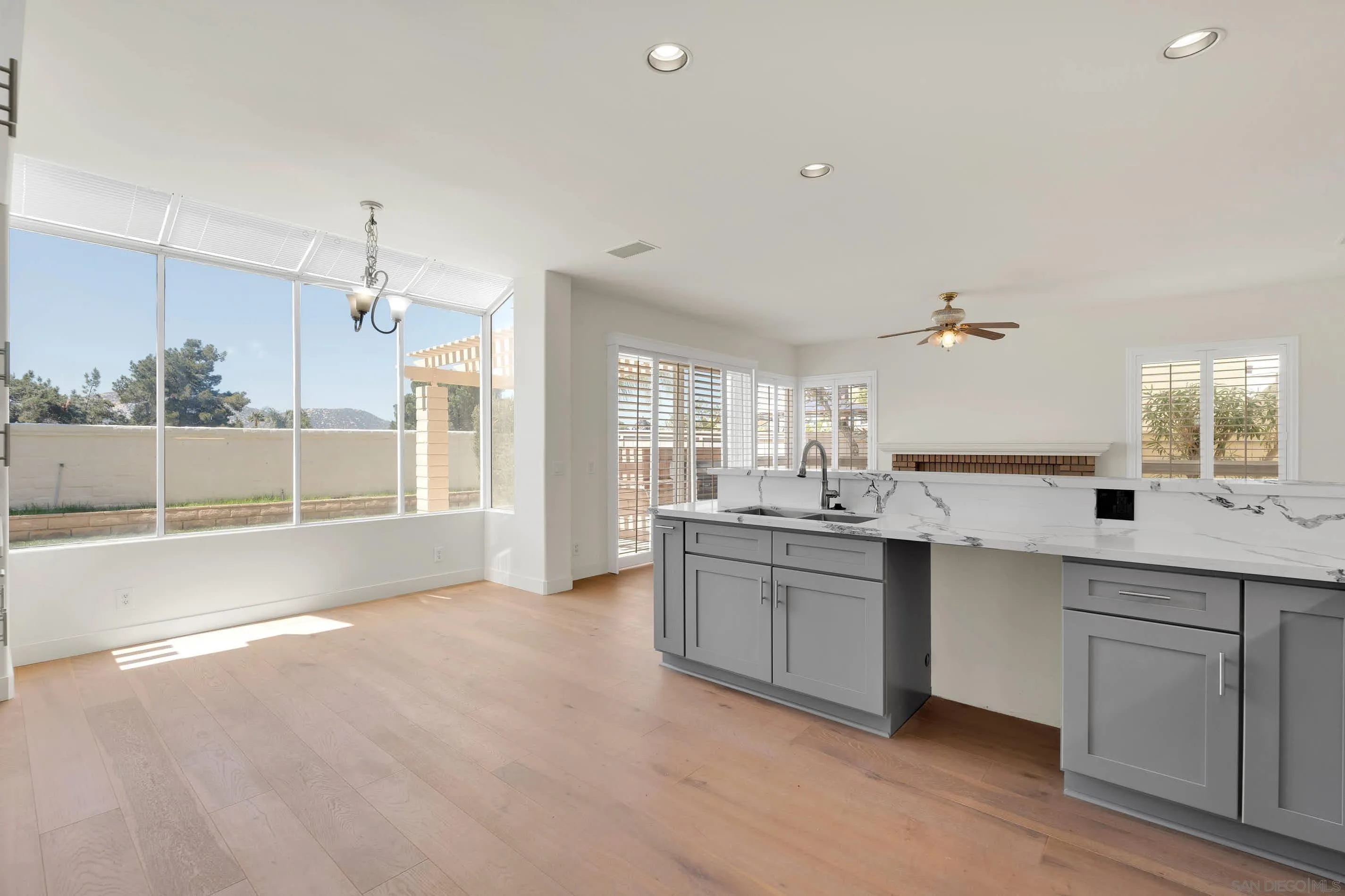 45441 Camino Monzon Temecula, CA 92592 - Photo 11 of 53 a large kitchen with kitchen island a sink stainless steel appliances and cabinets