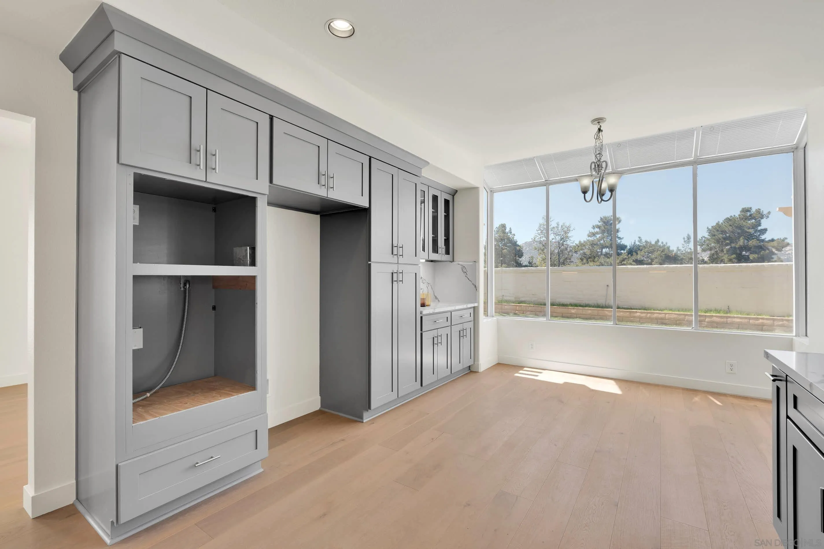 45441 Camino Monzon Temecula, CA 92592 - Photo 12 of 53 a view of a kitchen with refrigerator and sink