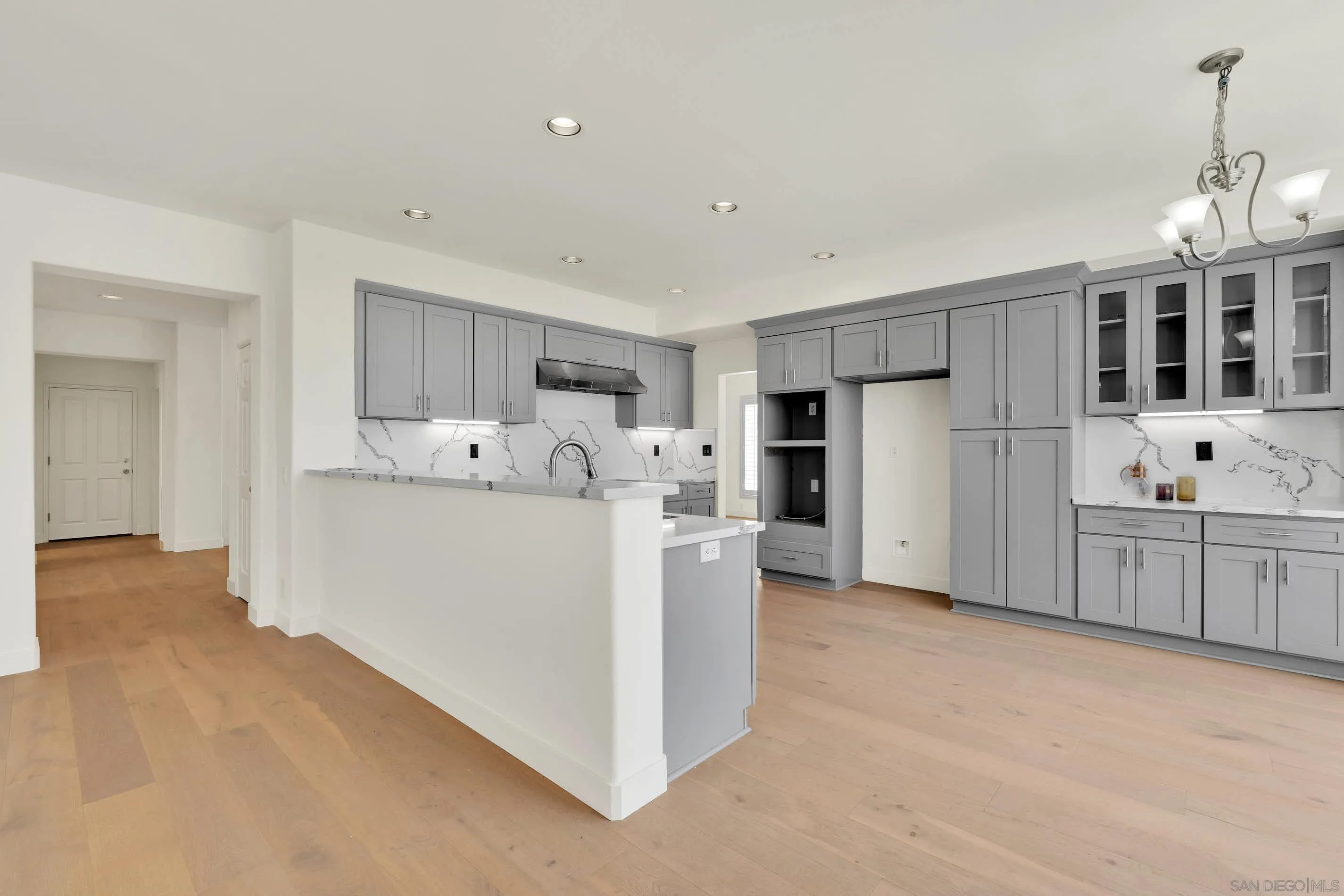 45441 Camino Monzon Temecula, CA 92592 - Photo 16 of 53 a view of a kitchen with refrigerator and cabinets