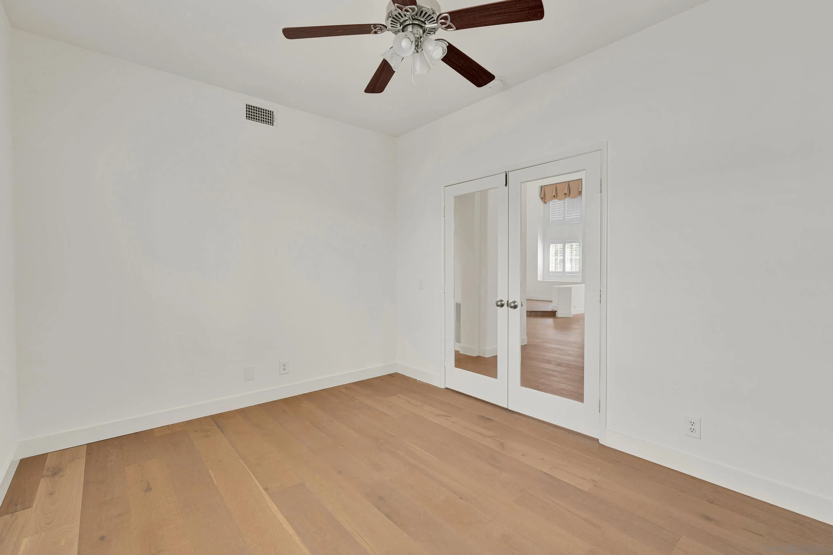 45441 Camino Monzon Temecula, CA 92592 - Photo 26 of 53 an empty room with closet and windows