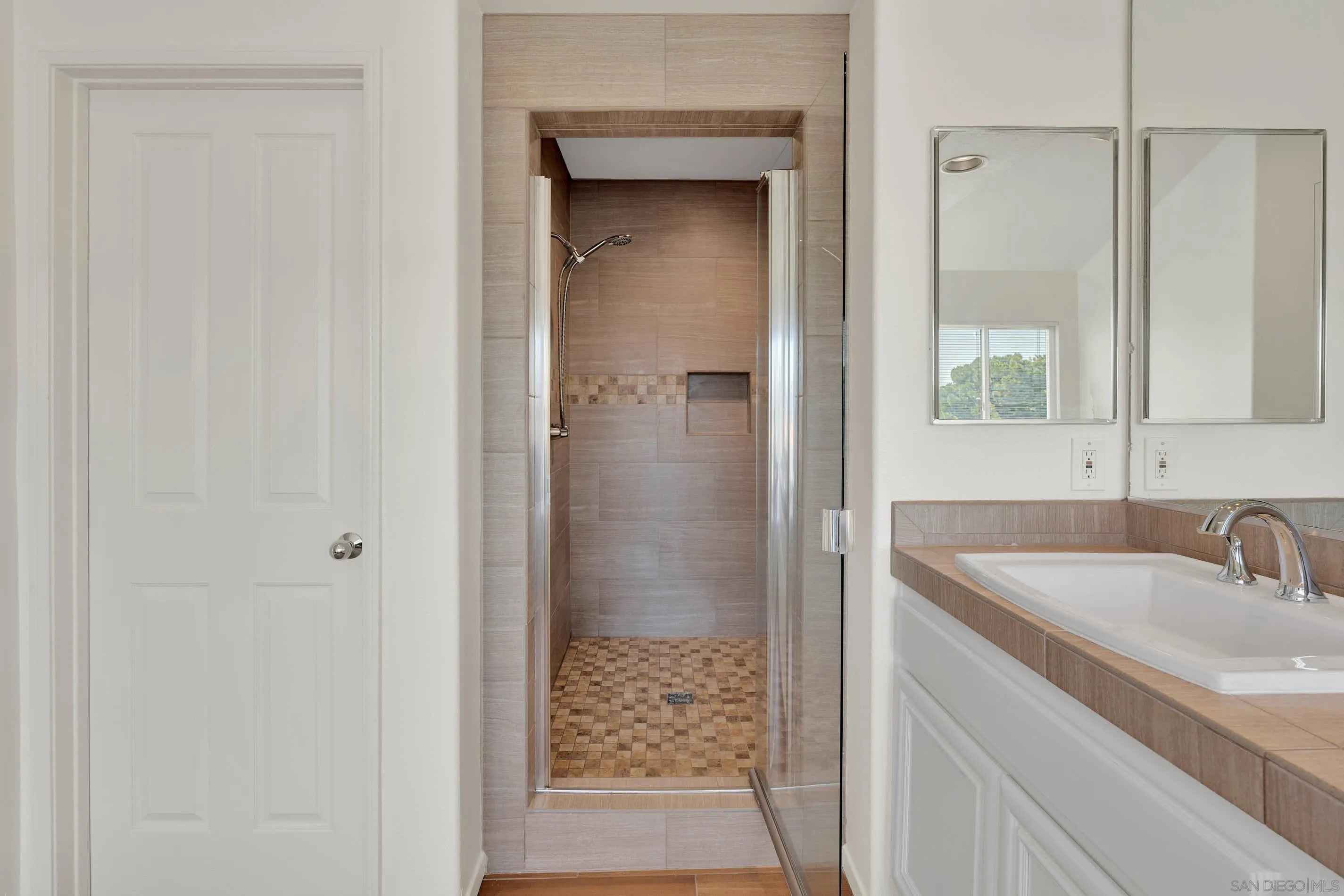 45441 Camino Monzon Temecula, CA 92592 - Photo 38 of 53 a bathroom with a sink and a shower