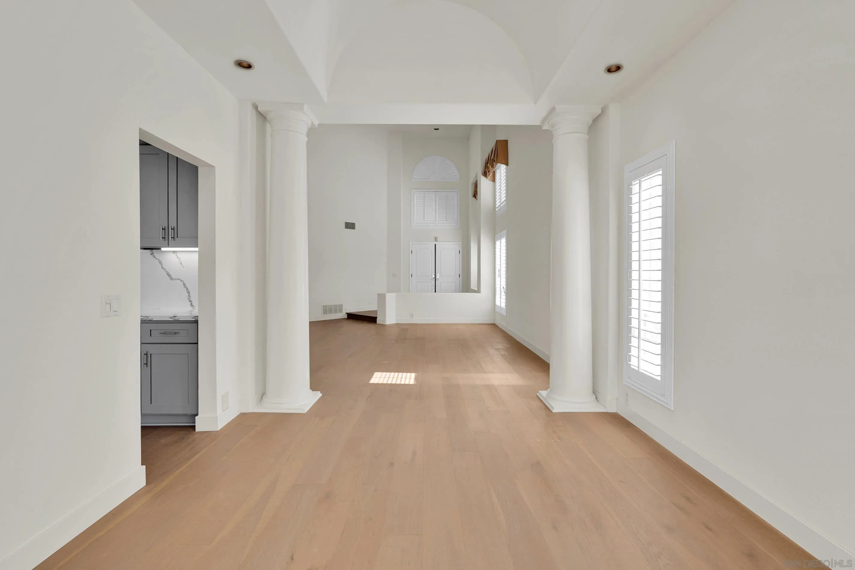45441 Camino Monzon Temecula, CA 92592 - Photo 39 of 53 a view of empty room with wooden floor and window