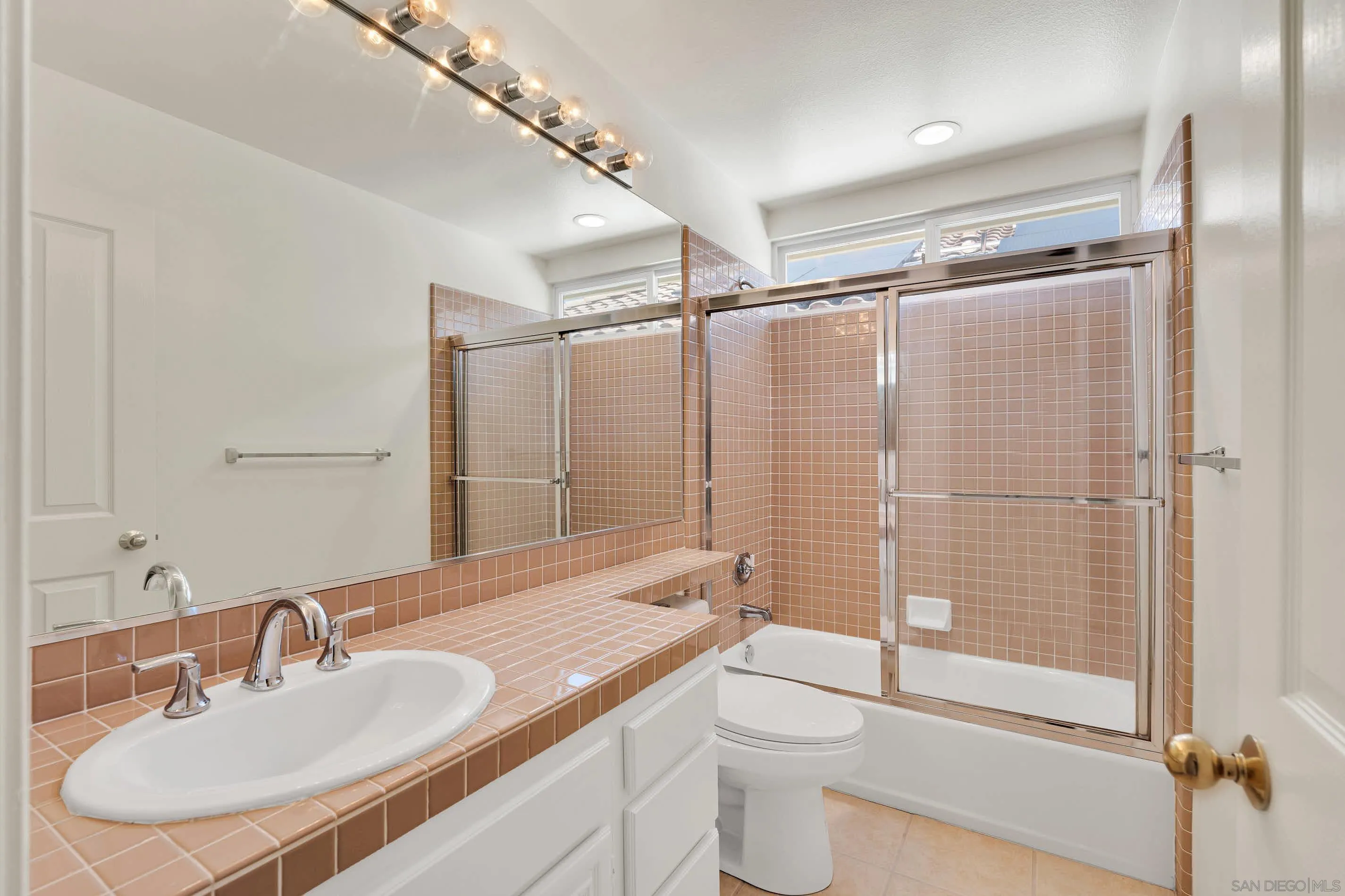45441 Camino Monzon Temecula, CA 92592 - Photo 41 of 53 a bathroom with a sink toilet and shower