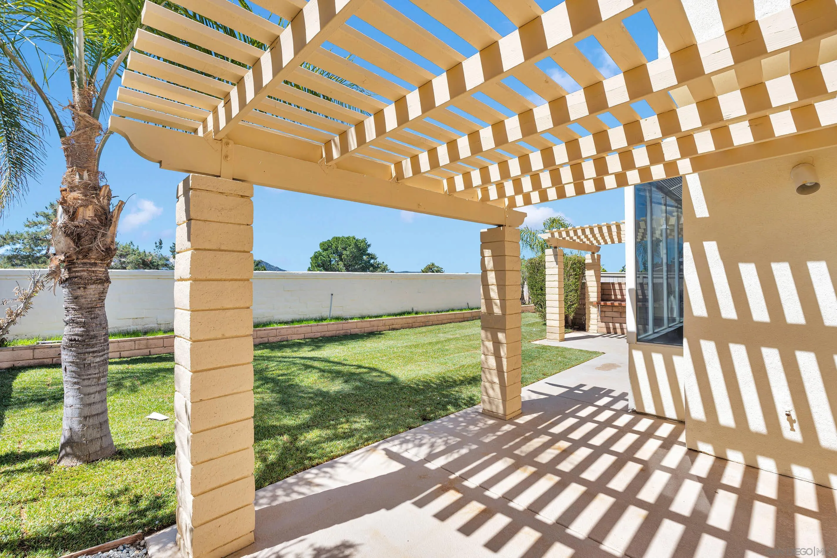 45441 Camino Monzon Temecula, CA 92592 - Photo 48 of 53 a front view of a house with a yard