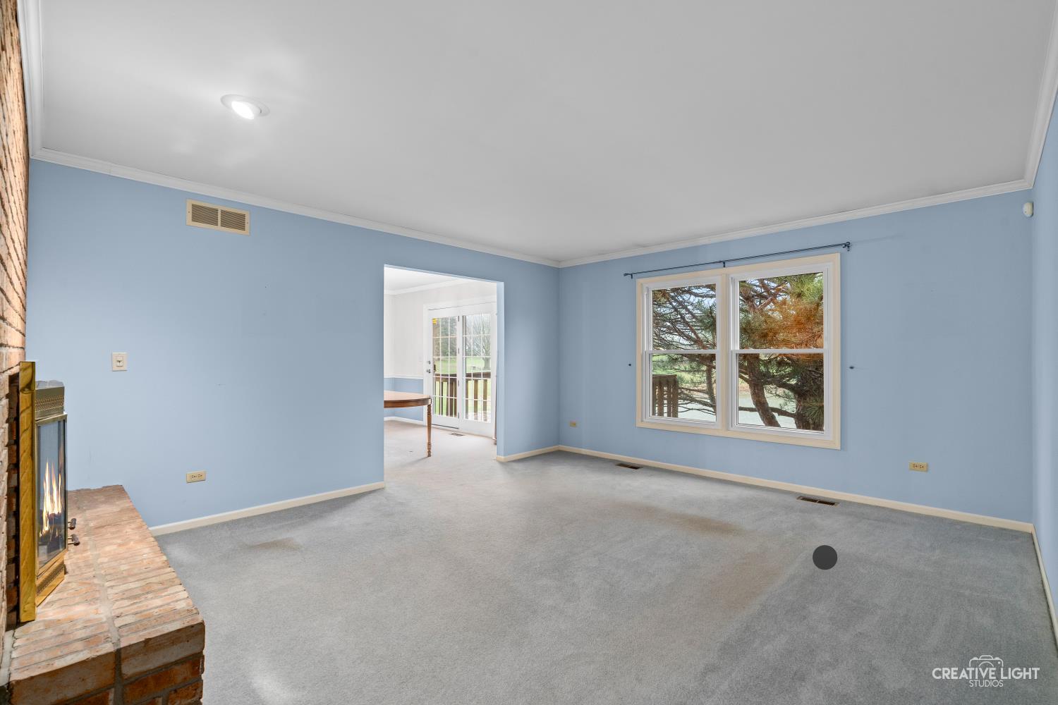 11N638 Old Barn Road Elgin, IL 60124 - Photo 3 of 26 a view of an empty room with a window