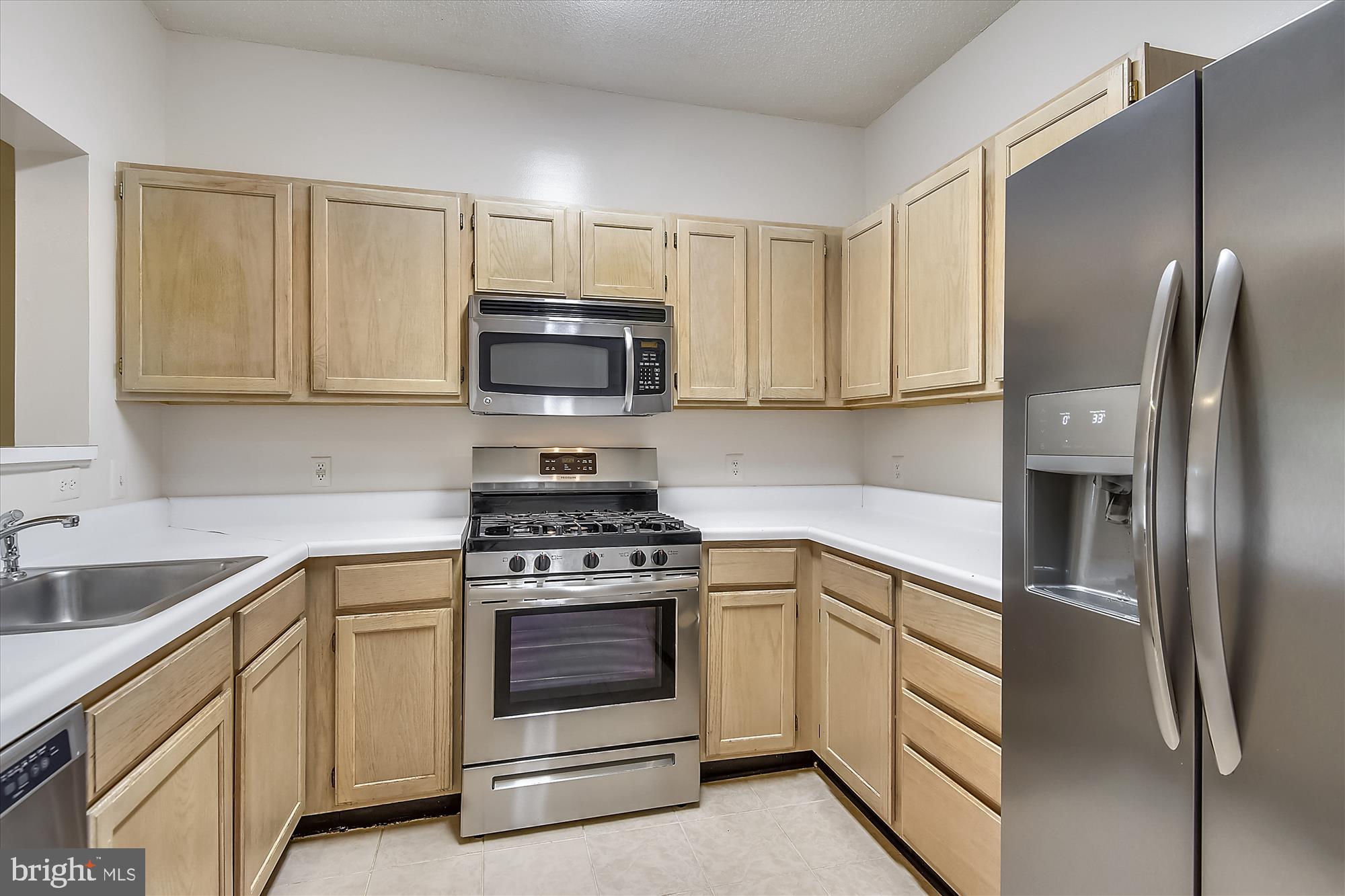 1716 Lake Shore Crest Drive, Unit 5 Reston, VA 20190 - Photo 5 of 27 Efficient Kitchen w/Great Storage & Work Space