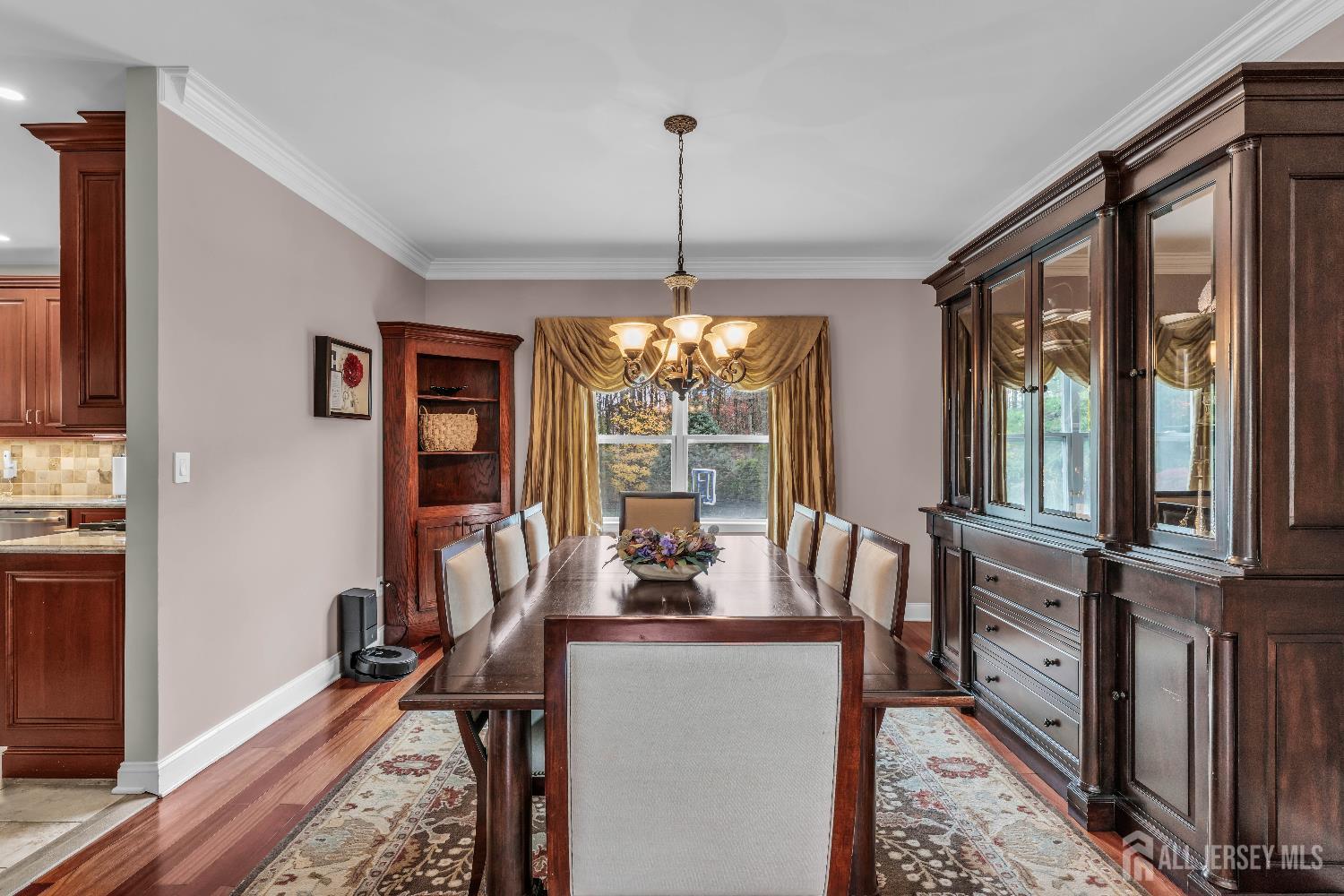 26 Cannon Road Old Bridge, NJ 08857 - Photo 14 of 39 a dining room with furniture a chandelier and wooden floor