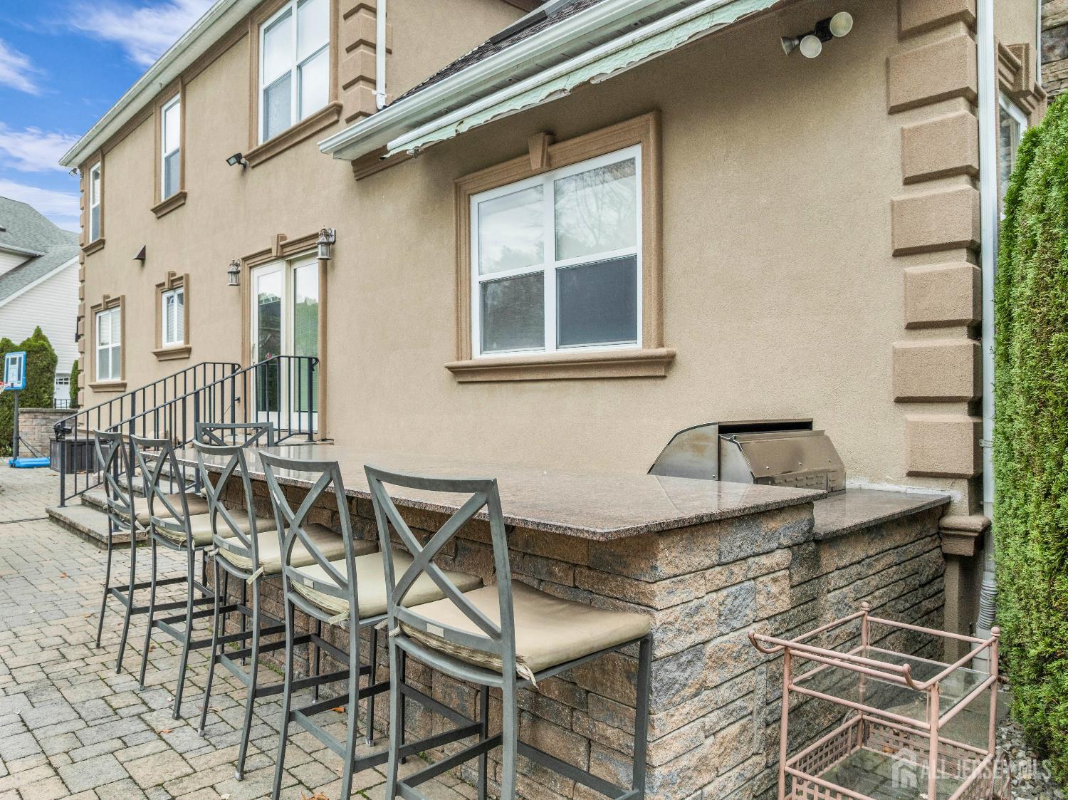 26 Cannon Road Old Bridge, NJ 08857 - Photo 10 of 39 a patio with table and chairs