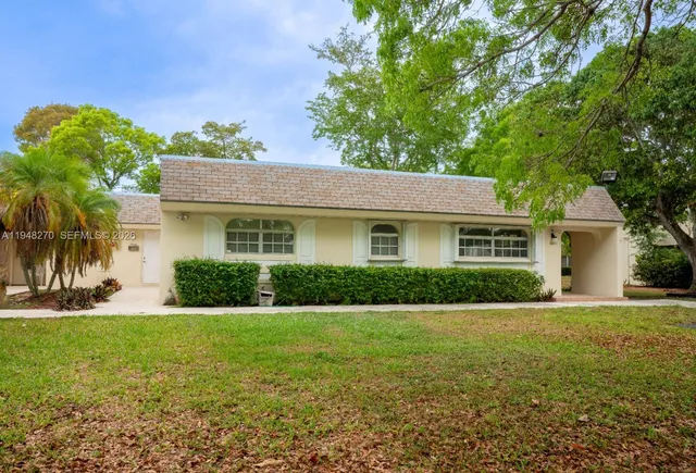 a view of a hallway with wooden shelves