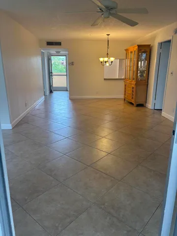 a view of a livingroom with wooden floor