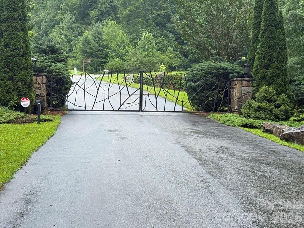 Lot 6 Garnet Road Sylva, NC 28779 - Photo 8 of 9 a view of a street with a yard