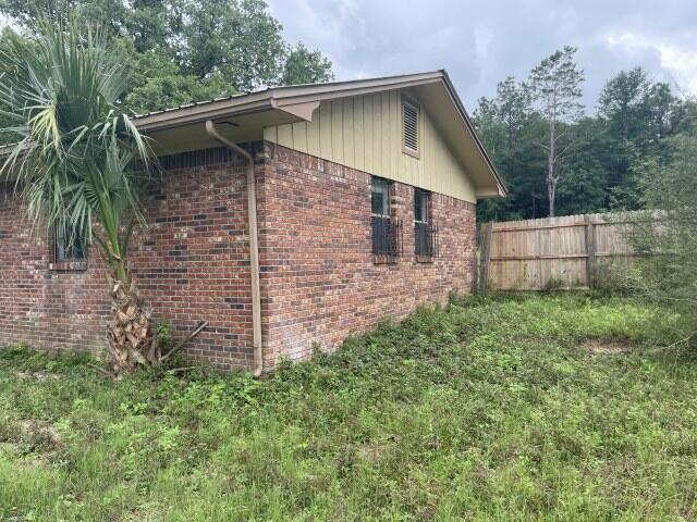 6047 Eden Square Crestview, FL 32539 - Photo 33 of 39 a view of a backyard with plants