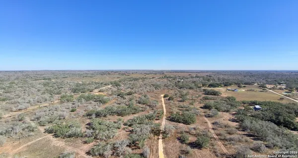 a view of wooden floor in a bathroom
