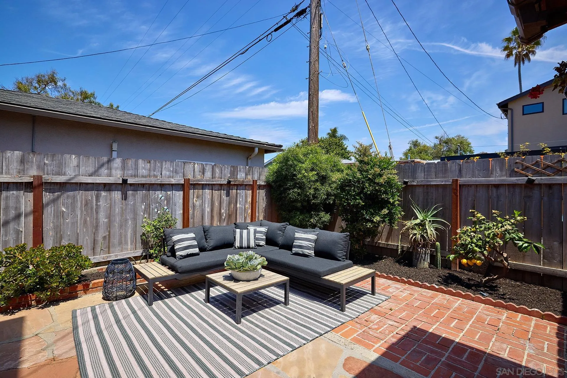 211 La Mesa Avenue Encinitas, CA 92024 - Photo 30 of 53 a backyard of a house with seating space