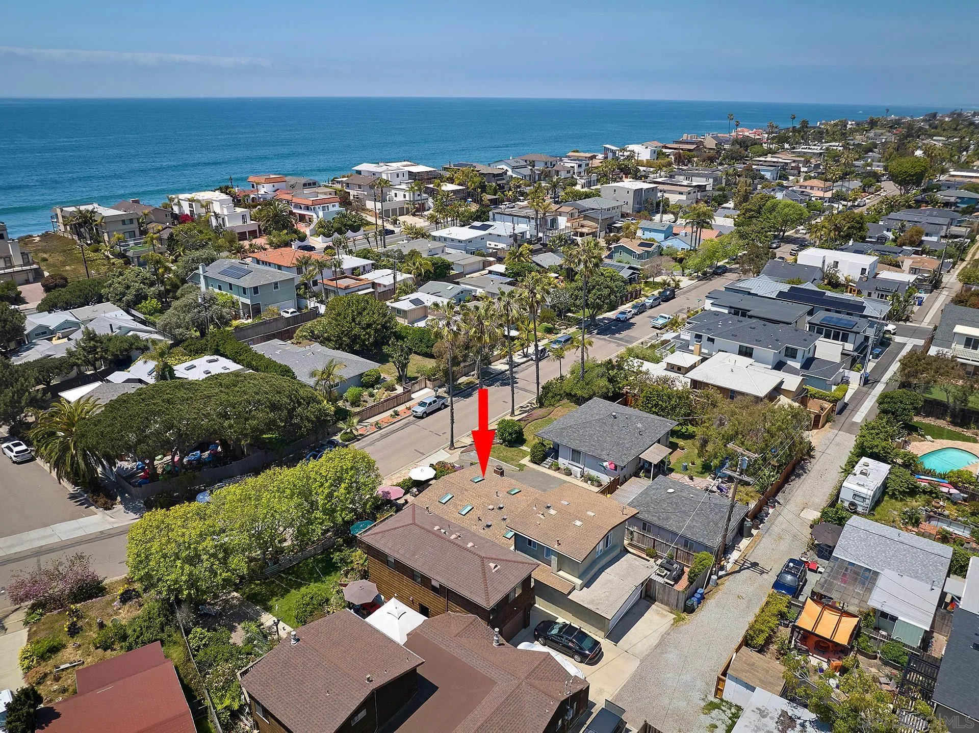 211 La Mesa Avenue Encinitas, CA 92024 - Photo 40 of 53 an aerial view of a city with lots of residential buildings and ocean view in back