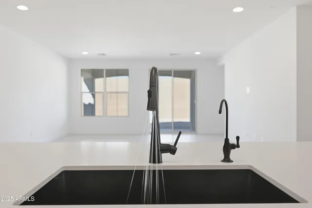 an empty room with a natural light