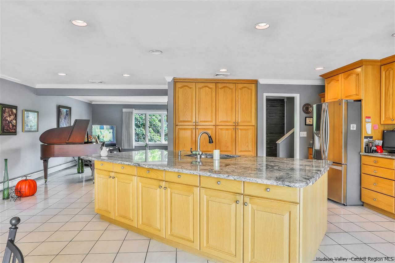17 Deller Road Highland, NY 12528 - Photo 14 of 33 a kitchen with a sink and living room