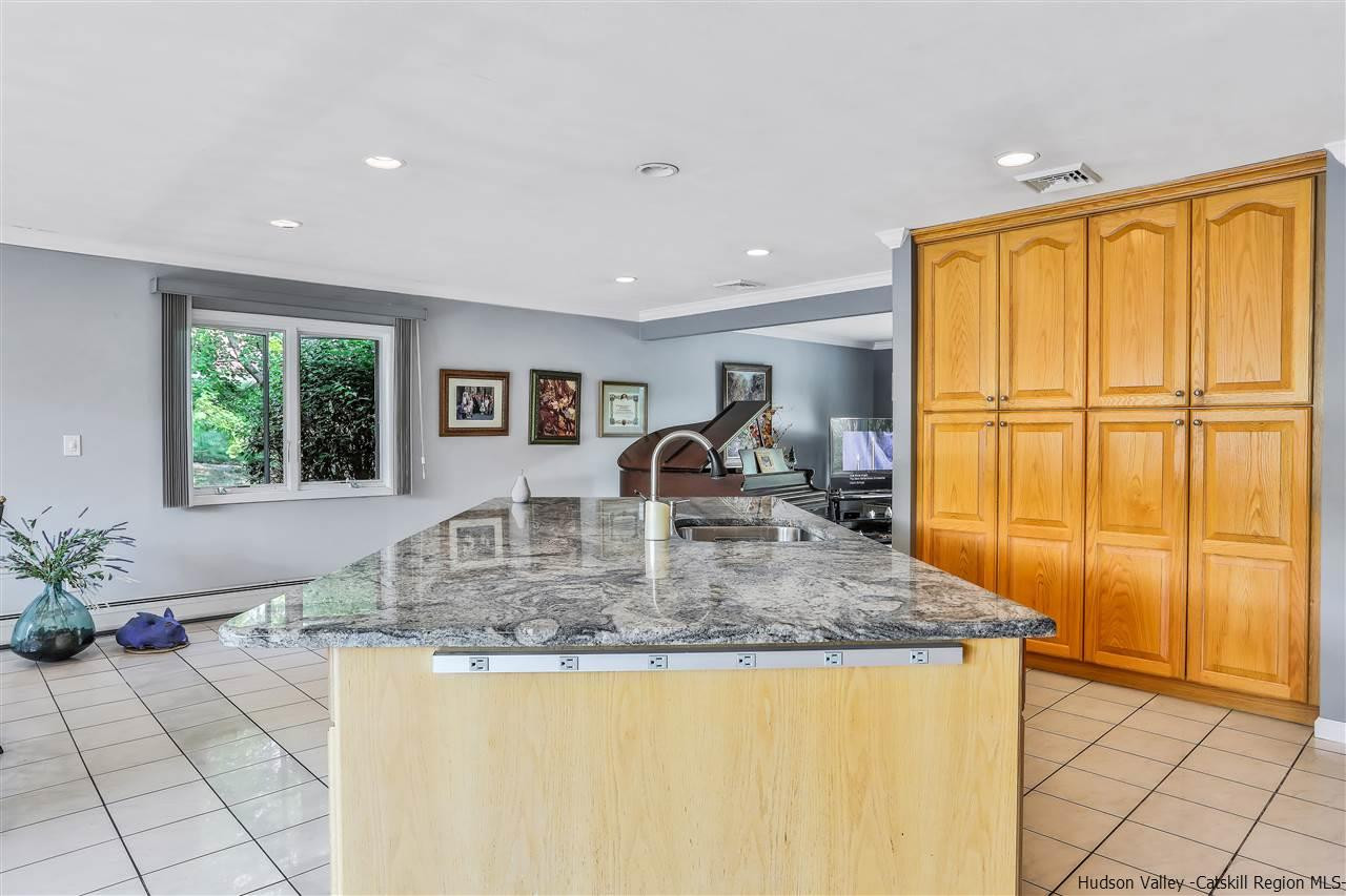 17 Deller Road Highland, NY 12528 - Photo 16 of 33 a kitchen with sink refrigerator and large window