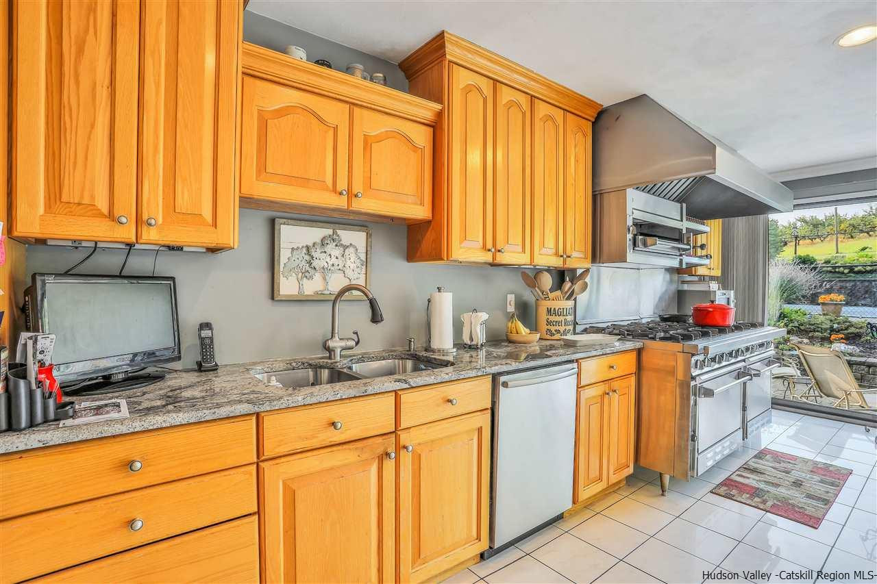 17 Deller Road Highland, NY 12528 - Photo 17 of 33 a kitchen with stainless steel appliances granite countertop a sink and cabinets