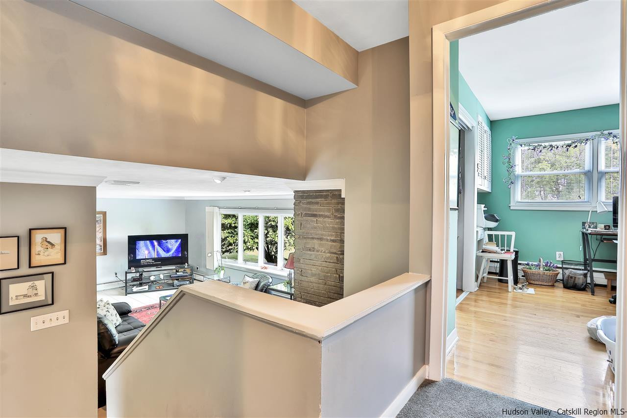 17 Deller Road Highland, NY 12528 - Photo 21 of 33 a living room with furniture and a flat screen tv