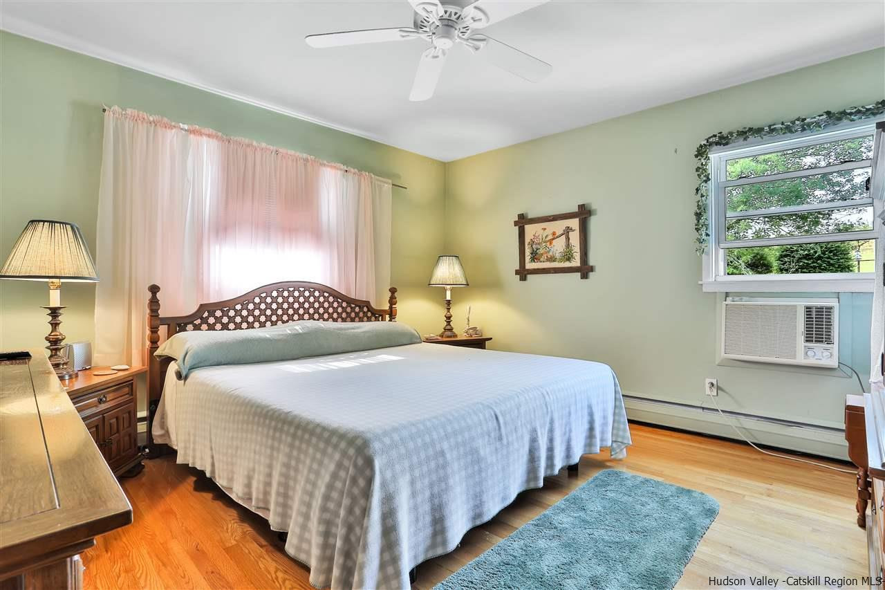 17 Deller Road Highland, NY 12528 - Photo 22 of 33 a bedroom with bed and window