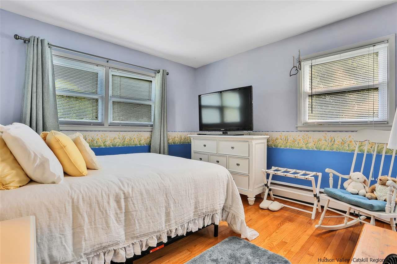 17 Deller Road Highland, NY 12528 - Photo 24 of 33 a bedroom with a bed and a flat screen tv