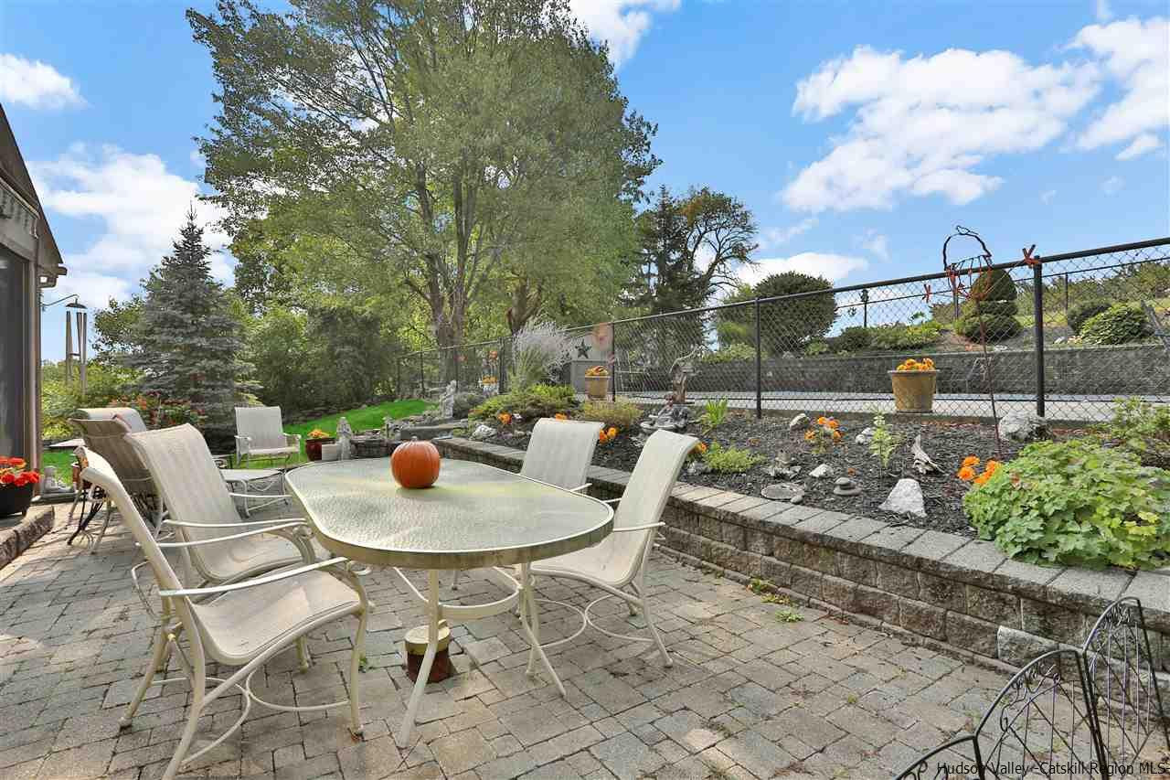 17 Deller Road Highland, NY 12528 - Photo 29 of 33 a view of a patio with table and chairs and a potted plants