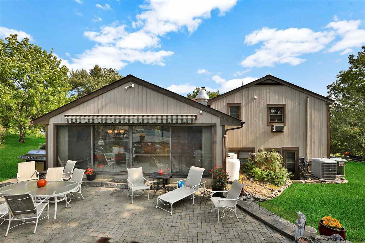 17 Deller Road Highland, NY 12528 - Photo 33 of 33 a view of a house with backyard sitting area and garden