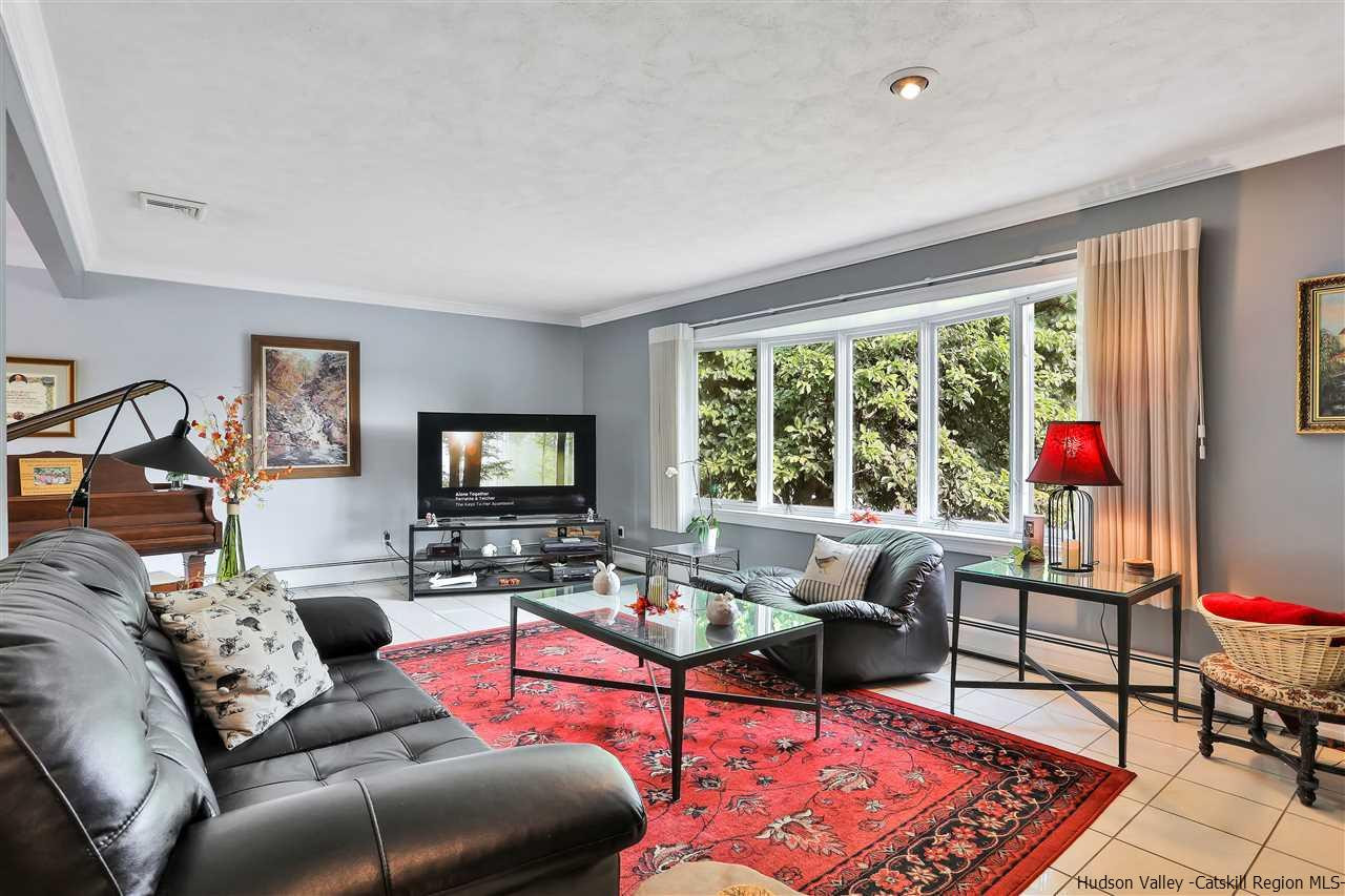 17 Deller Road Highland, NY 12528 - Photo 6 of 33 a living room with furniture and a flat screen tv