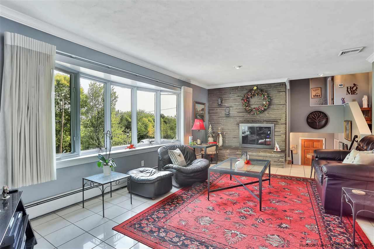 17 Deller Road Highland, NY 12528 - Photo 8 of 33 a living room with furniture and a large window
