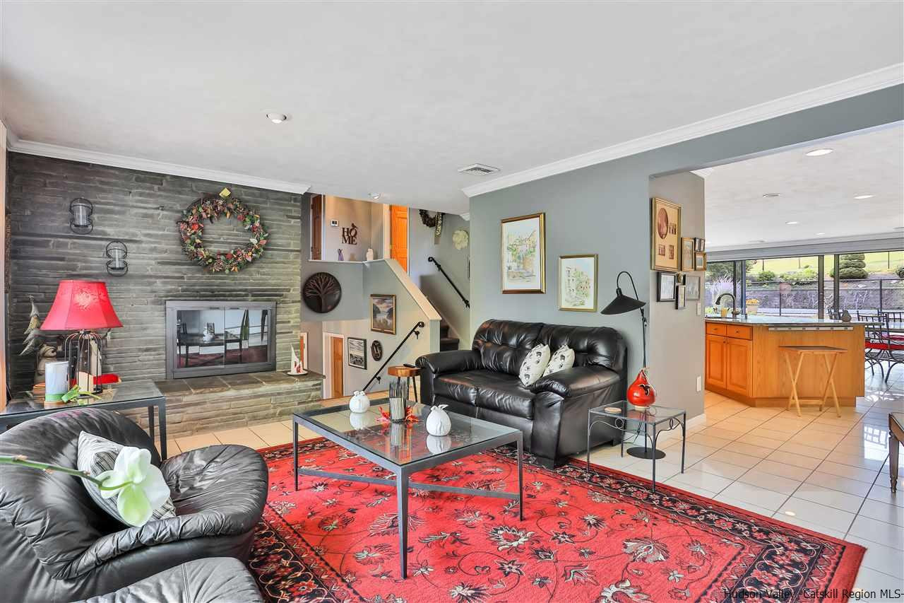 17 Deller Road Highland, NY 12528 - Photo 9 of 33 a living room with furniture and a flat screen tv