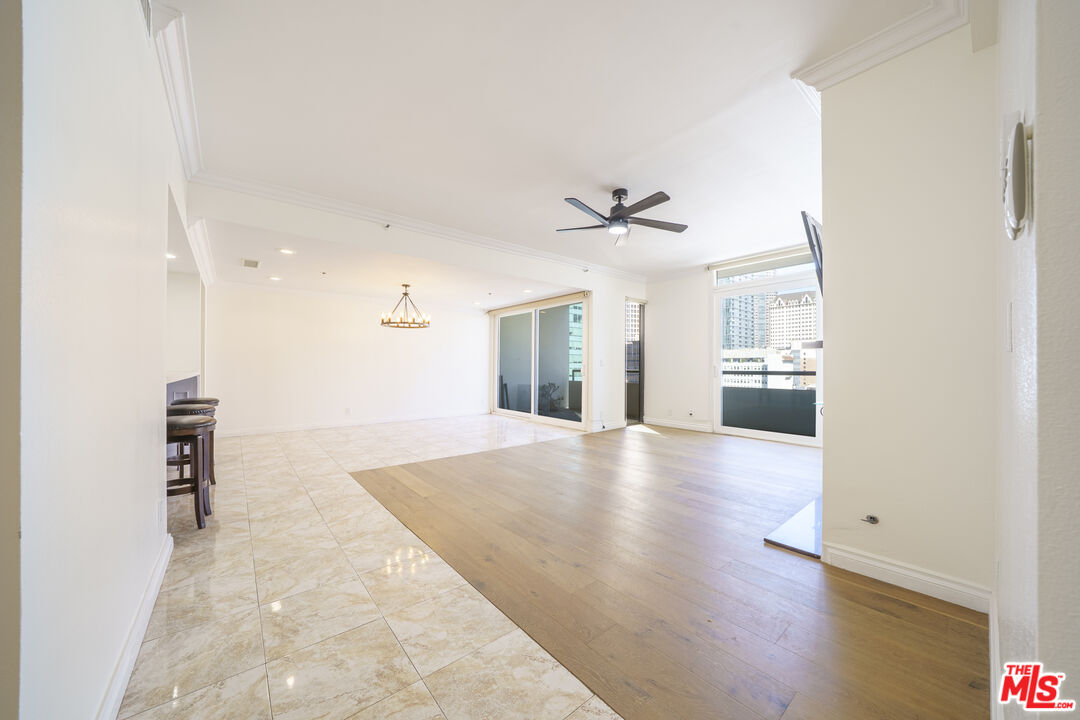 600 West 9th Street, Unit 1502 Los Angeles, CA 90015 - Photo 12 of 37 a view of a kitchen with a sink and a refrigerator