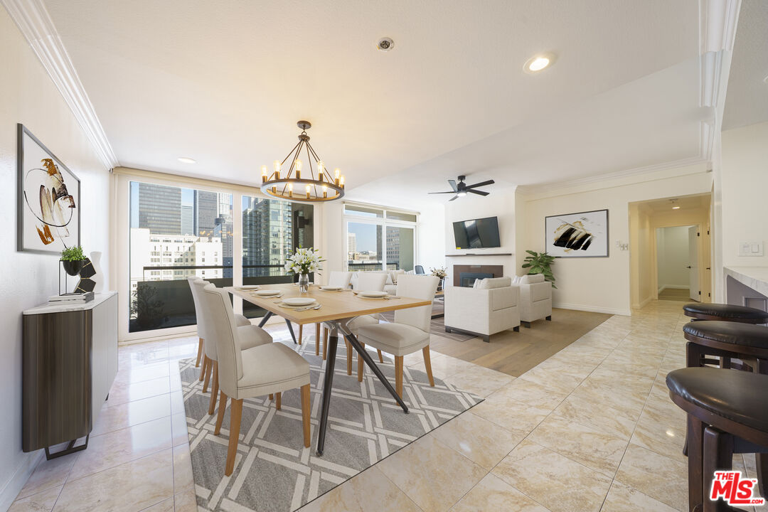 600 West 9th Street, Unit 1502 Los Angeles, CA 90015 - Photo 24 of 37 a view of a dining room with furniture