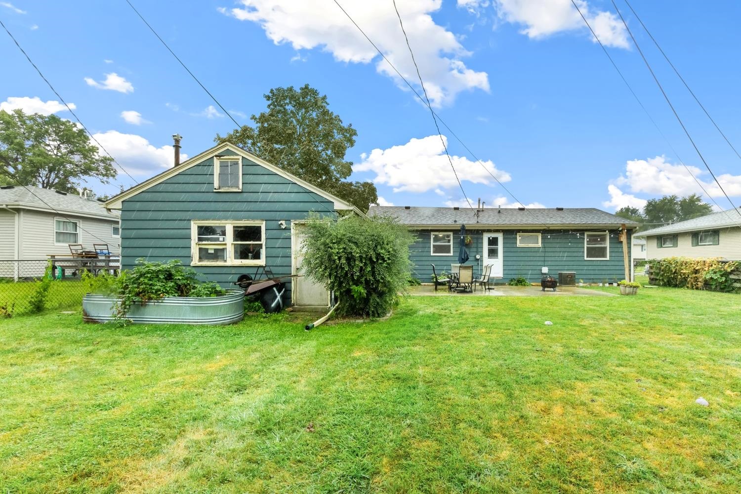 1202 East Le Fevre Road Sterling, IL 61081 - Photo 19 of 20 a front view of a house with garden
