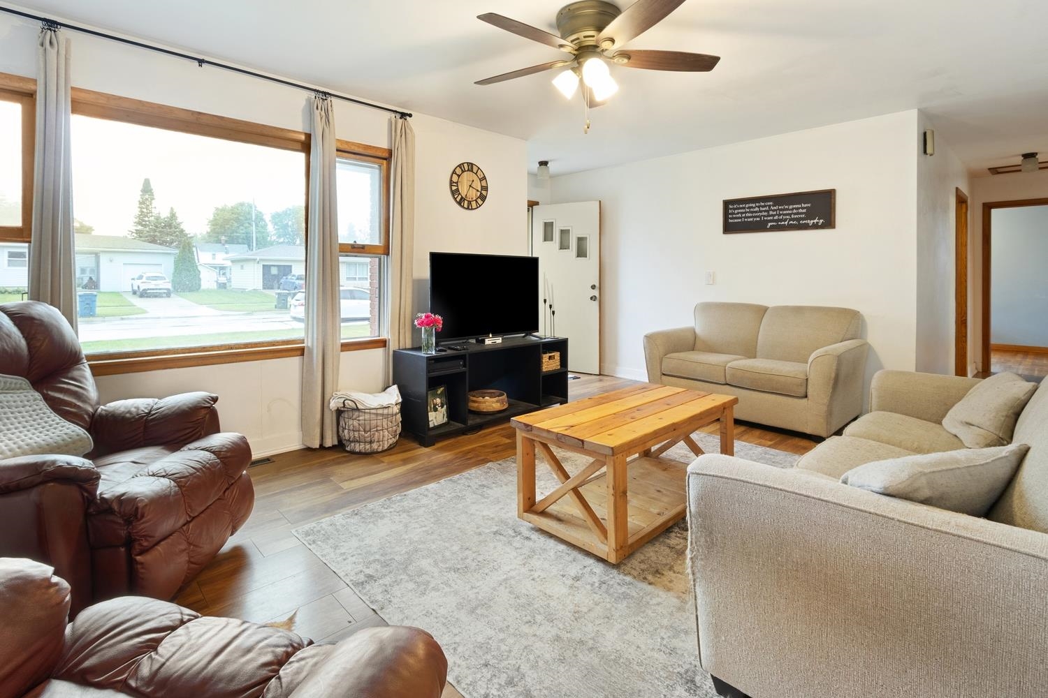 1202 East Le Fevre Road Sterling, IL 61081 - Photo 5 of 20 a living room with furniture and a flat screen tv