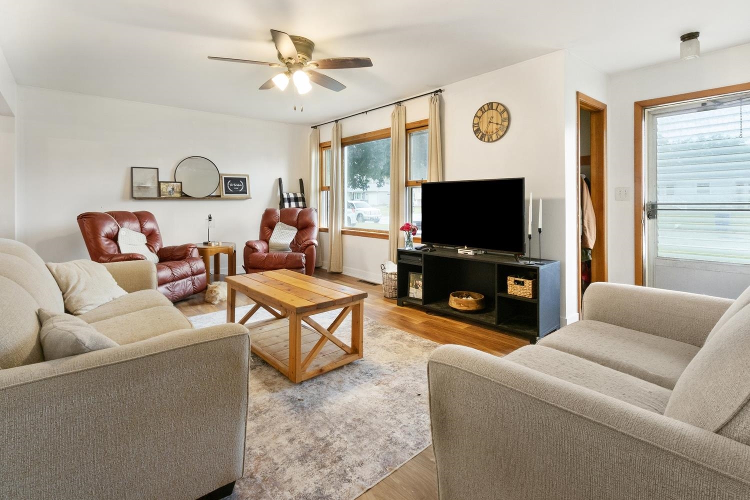 1202 East Le Fevre Road Sterling, IL 61081 - Photo 7 of 20 a living room with furniture and a flat screen tv