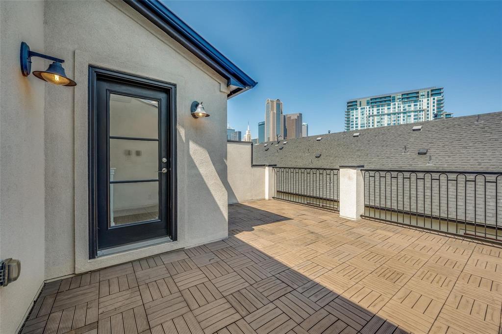 2135 Marilla Street Dallas, TX 75201 - Photo 19 of 23 a view of a house with wooden floor