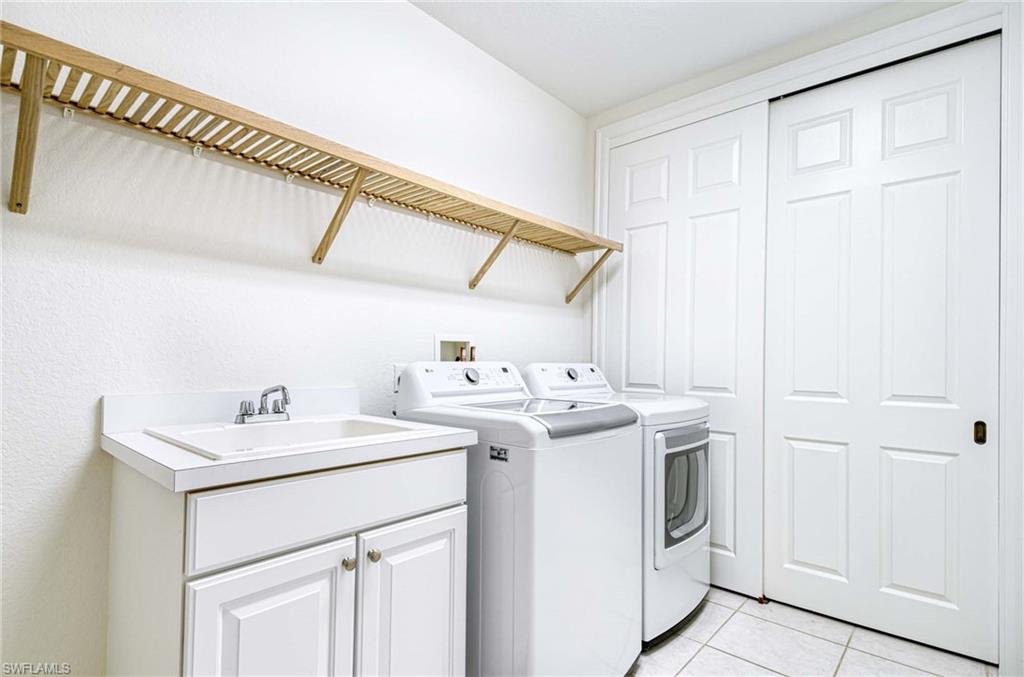 8649 Champions Point, Unit 1201 Naples, FL 34113 - Photo 17 of 23 Laundry Room with deep sink