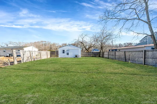 a view of a backyard with a garden