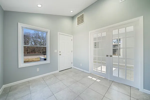 a view of an empty room with window