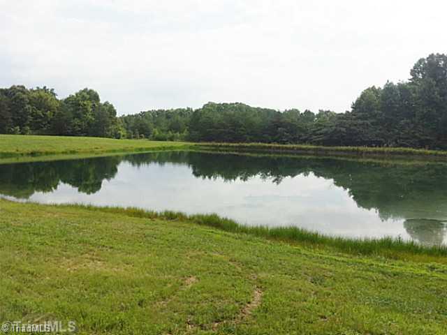 2040 Dodgetown Road Walnut Cove, NC 27052 - Photo 4 of 11 Remarks. 1.5 acre pond