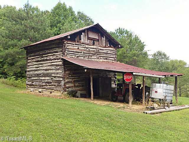 2040 Dodgetown Road Walnut Cove, NC 27052 - Photo 5 of 11 Stable/Barn. Old barn in good condition for storage with shelter