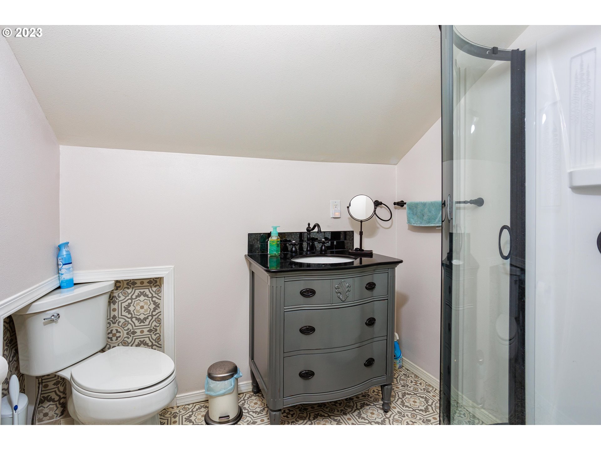116 South 4th Avenue Ridgefield, WA 98642 - Photo 18 of 31 a bathroom with a toilet sink and mirror