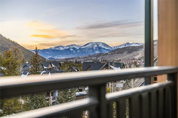 a view of a street from a balcony