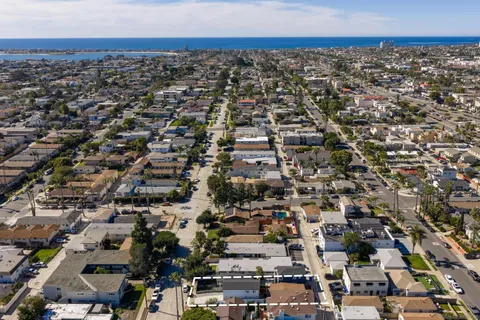 an aerial view of a city with lots of residential buildings