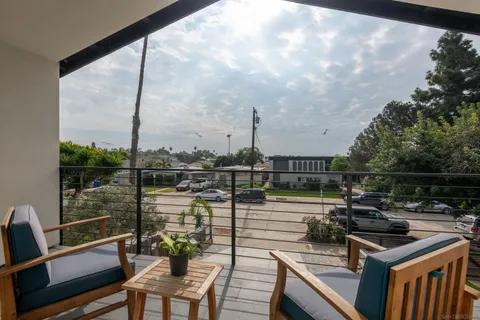 a view of a terrace with chairs