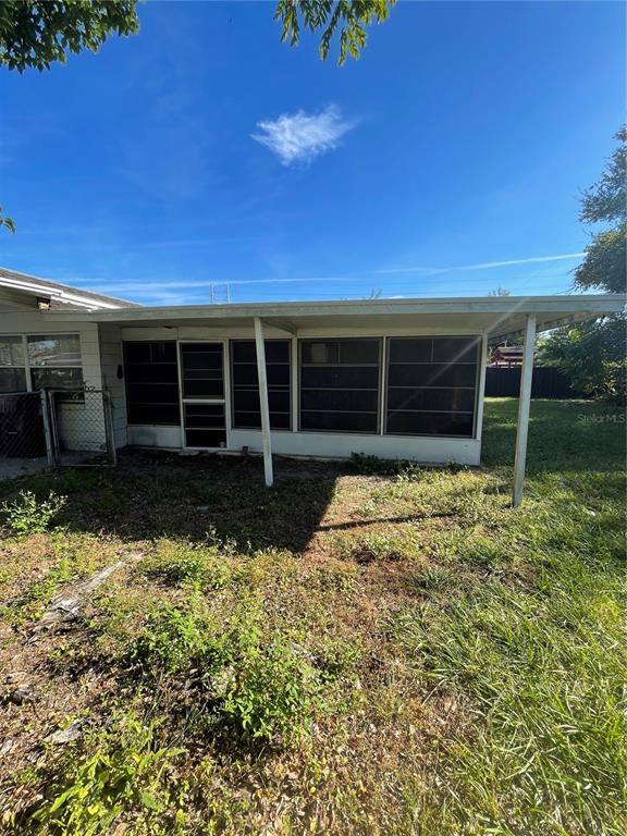 6442 Inca Street Orlando, FL 32807 - Photo 29 of 30 Screened porch