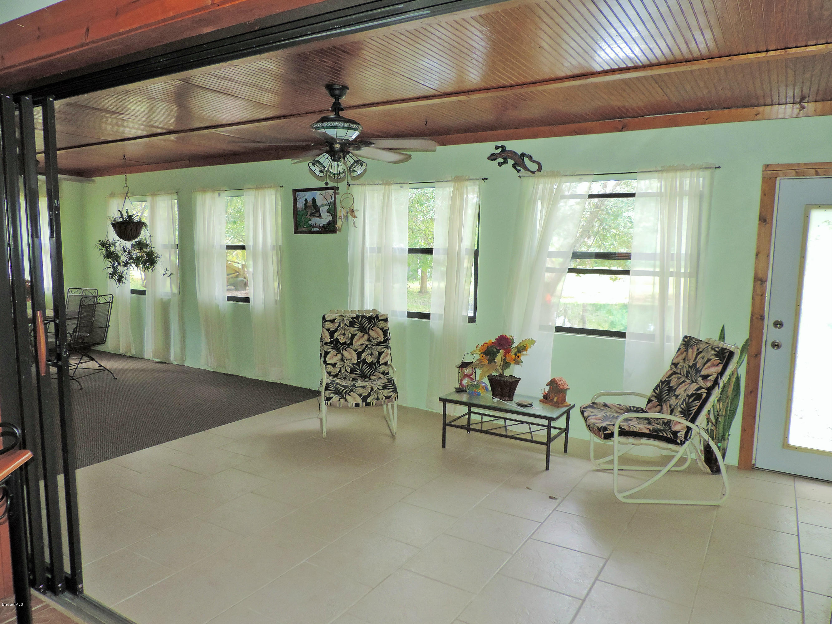 4240 Corey Road Grant Valkaria, FL 32950 - Photo 14 of 51 patio from living
